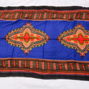 A blue and red blanket with an ornate design.