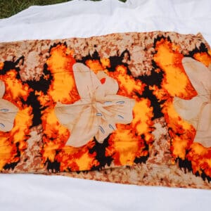 A table runner with leaves and fire on it.