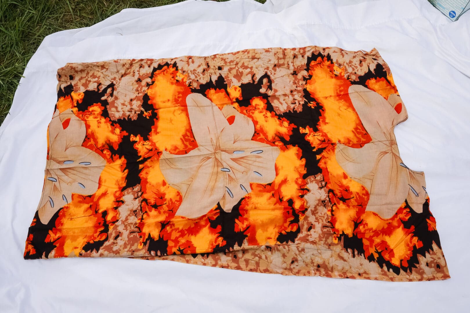 A table runner with leaves and fire on it.
